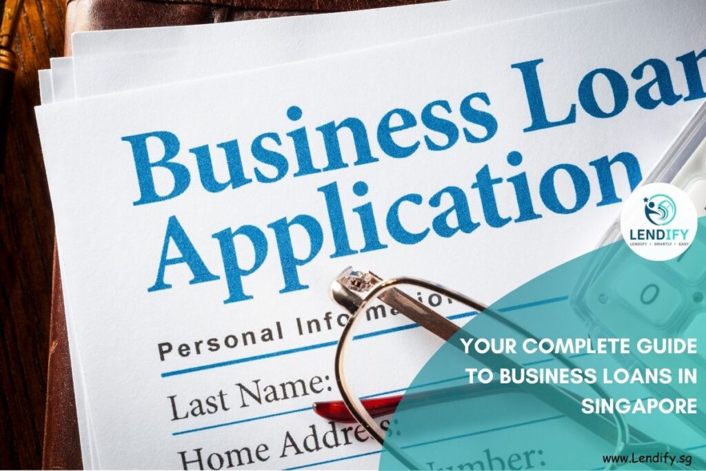 A stack of 'Business Loan Application' forms with eyeglasses on the top sheet, indicating a financial process. The image is branded with the Lendify logo and promotes 'Your Complete Guide to Business Loans in Singapore
